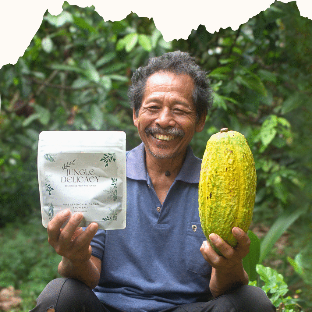 Balinese cacao farmer holding cacao pod and jungle delicacy 250g ceremonial cacao